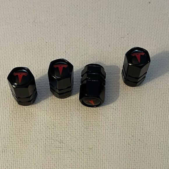 Tesla valve Stem caps in black set of 4 NWT - Picture 3 of 4